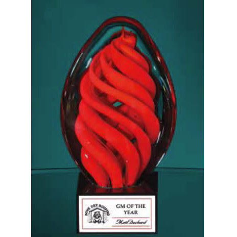 6 3/4" Tall 3.75" wide Red Swirl Egg on black glass base 